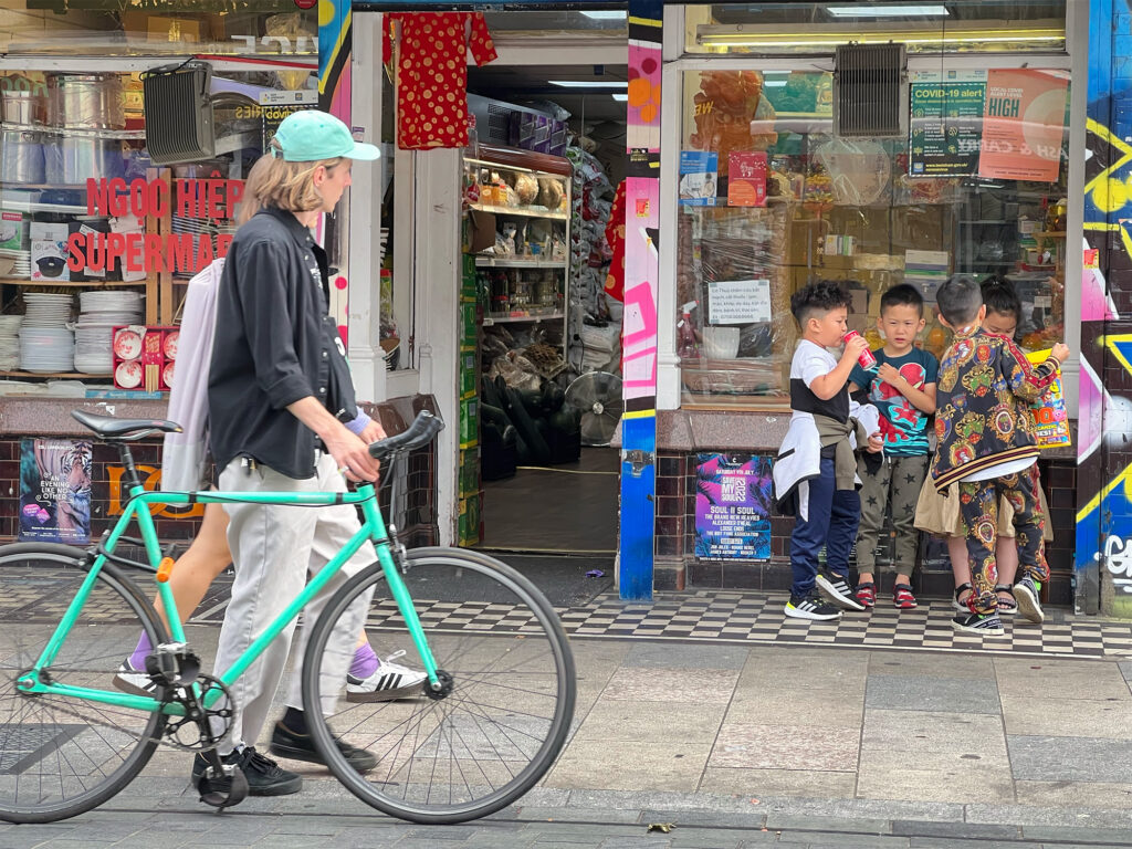 hipsters looking at kids - London