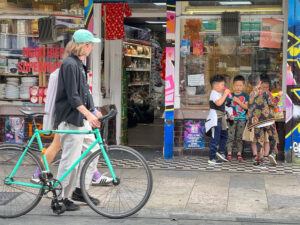 hipsters looking at kids - London